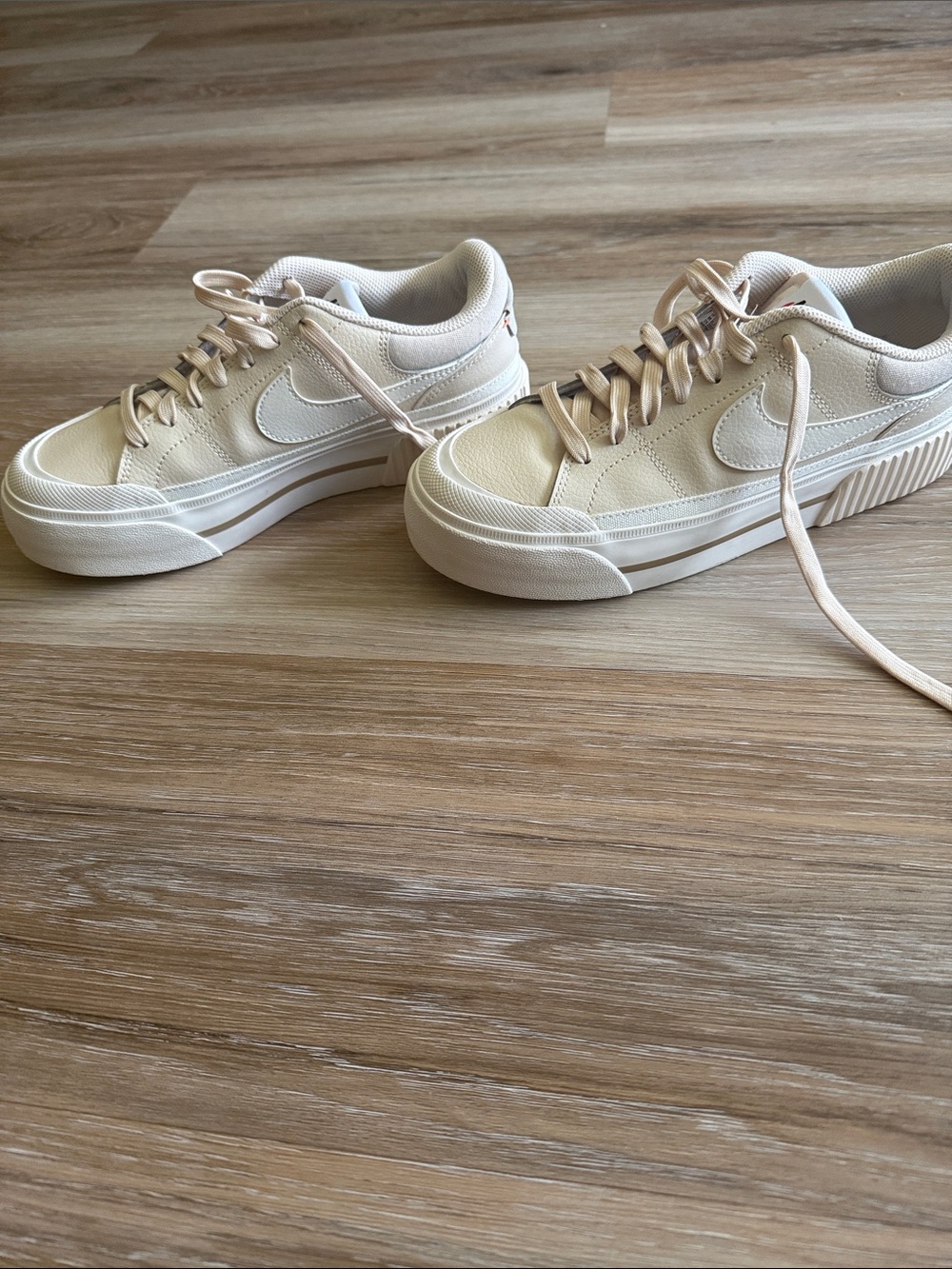 Nike Women’s Platform Sneakers in Light Cream